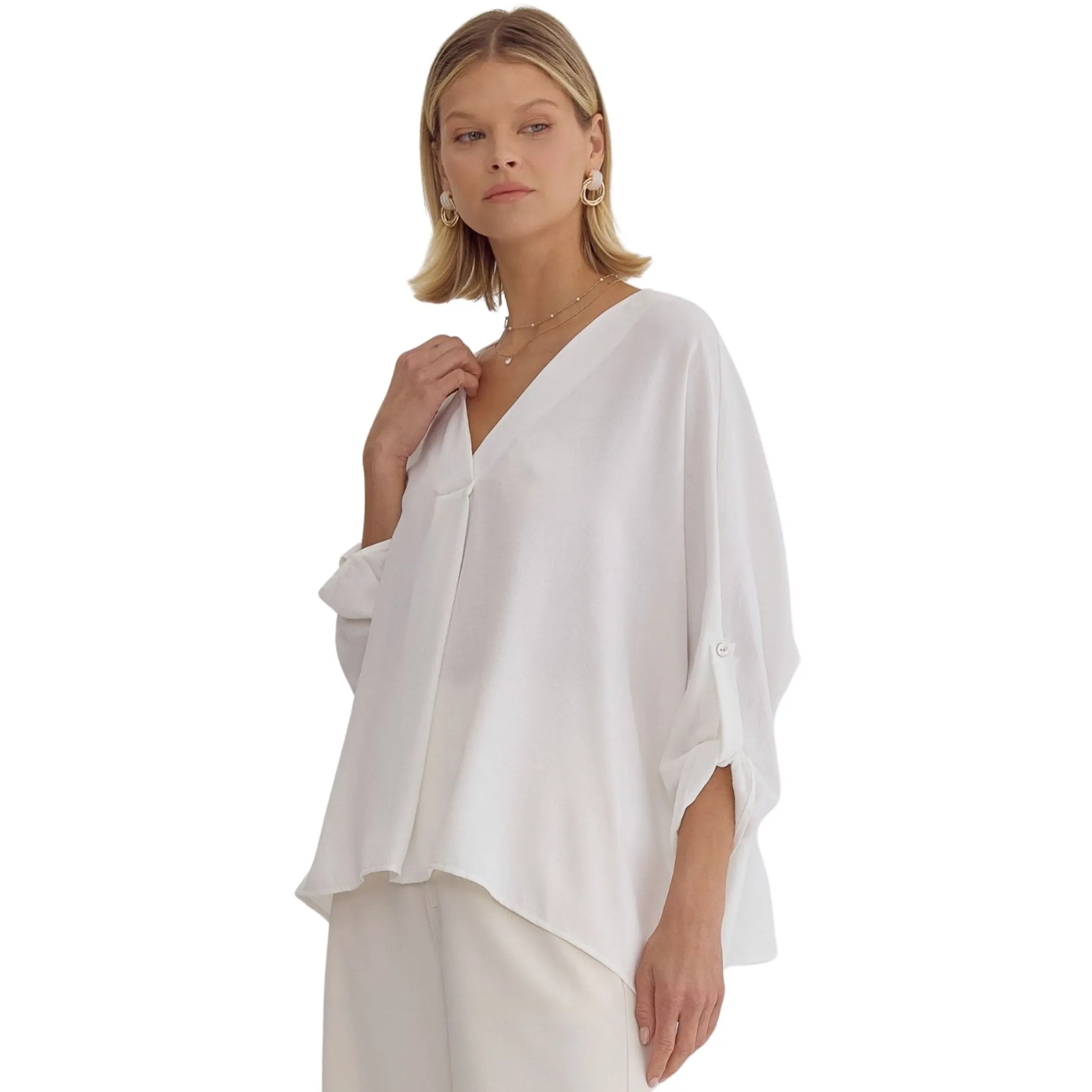 Off White V-neck 1/2 Sleeve Top Featuring Button Detailing at Sleeves.
