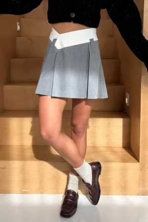 PLEATED ANGLED WAIST MINI SKIRT in IVORY/GREY